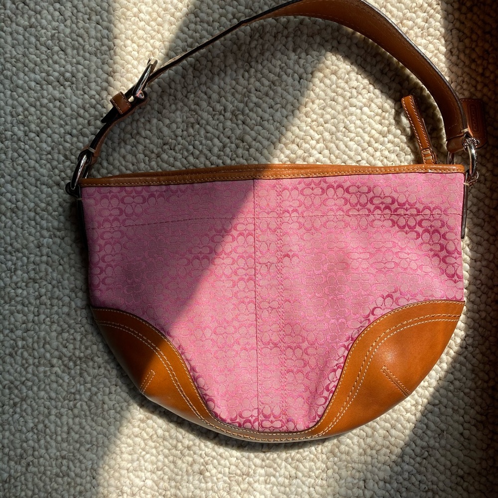 Saddle style coach bag